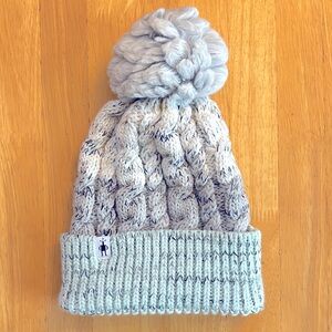 Smartwool pom-Pom hat made with merino wool , nylon and poly.